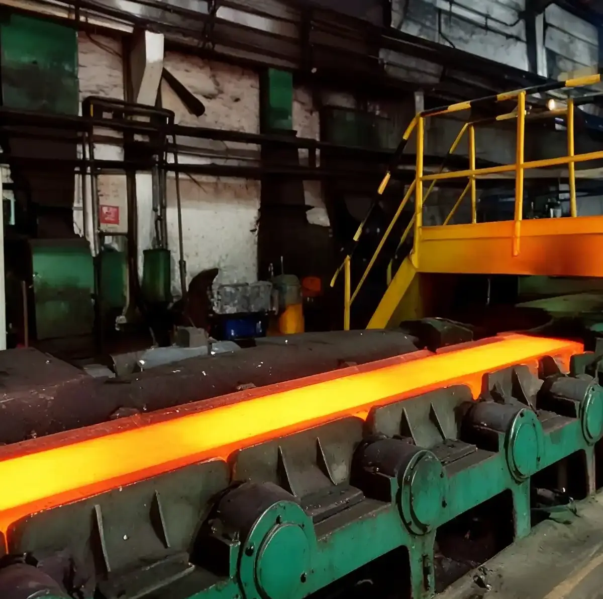 Lukai steel hot rolling process with red-hot metal sheets on the production line.